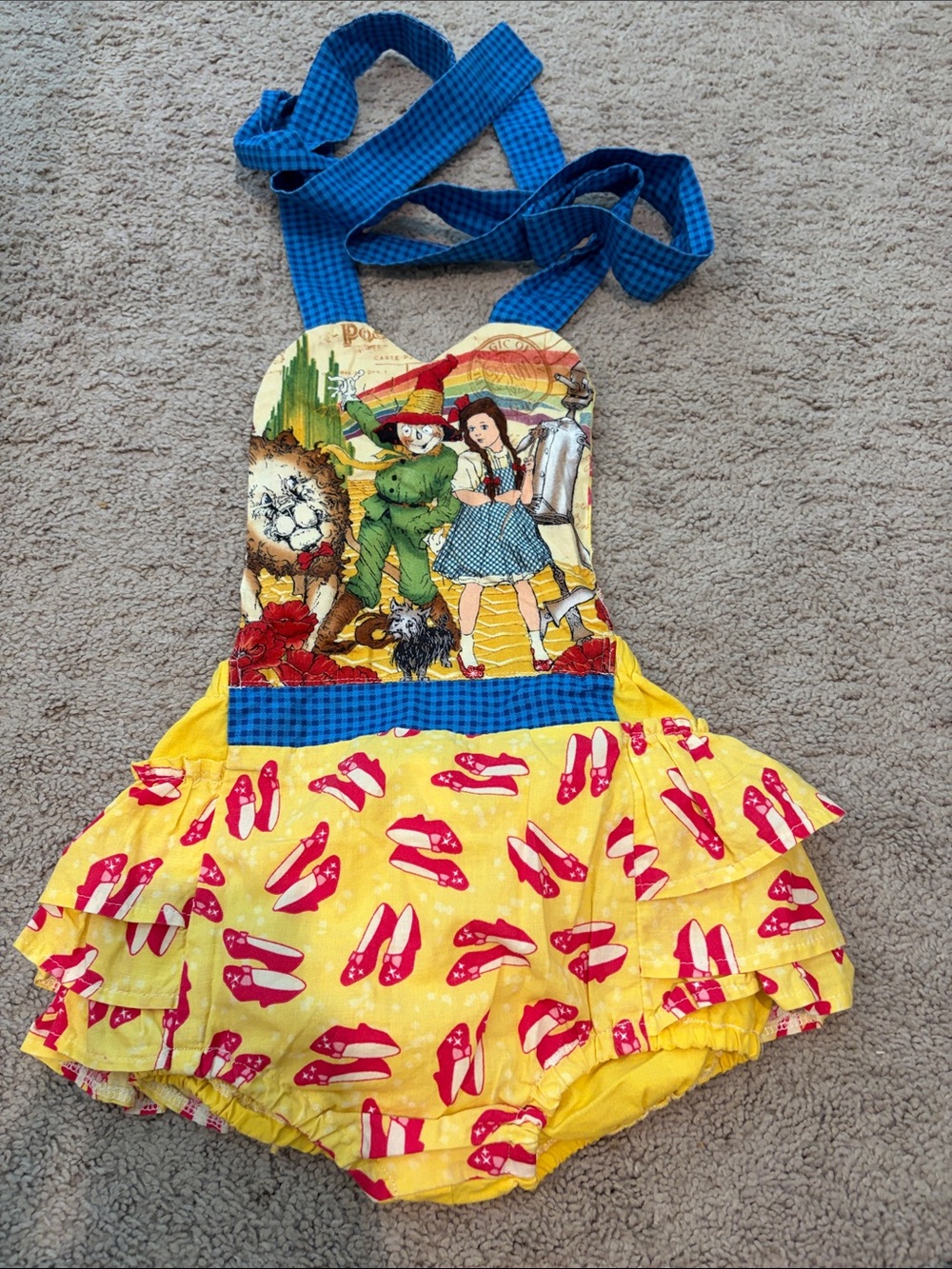 Little Diva’s HandmadeYellow Wizard of Oz Ruffle Romper with Blue Gingham Straps